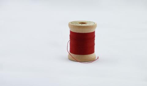 Spool of red thread