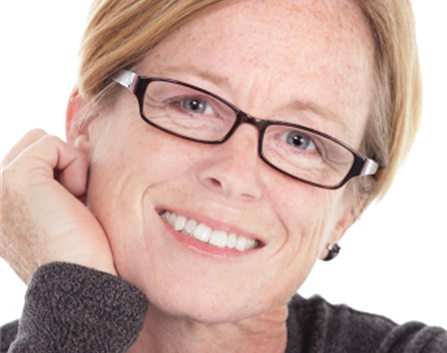 smiling mature woman with glasses