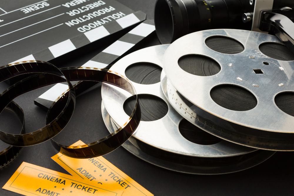 film reels, filmstrip, movie tickets, clapboard