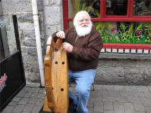 man playing harp