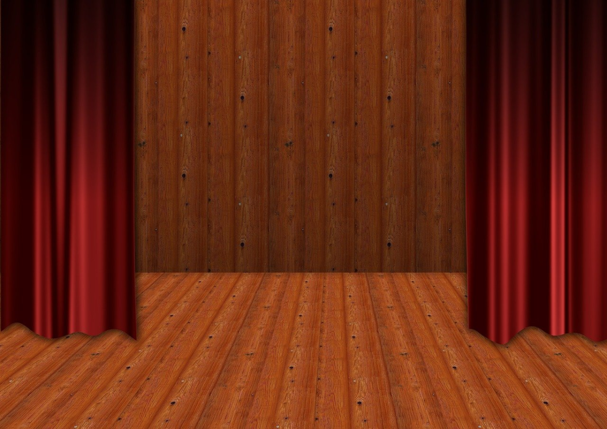 Stage with red velvet curtains